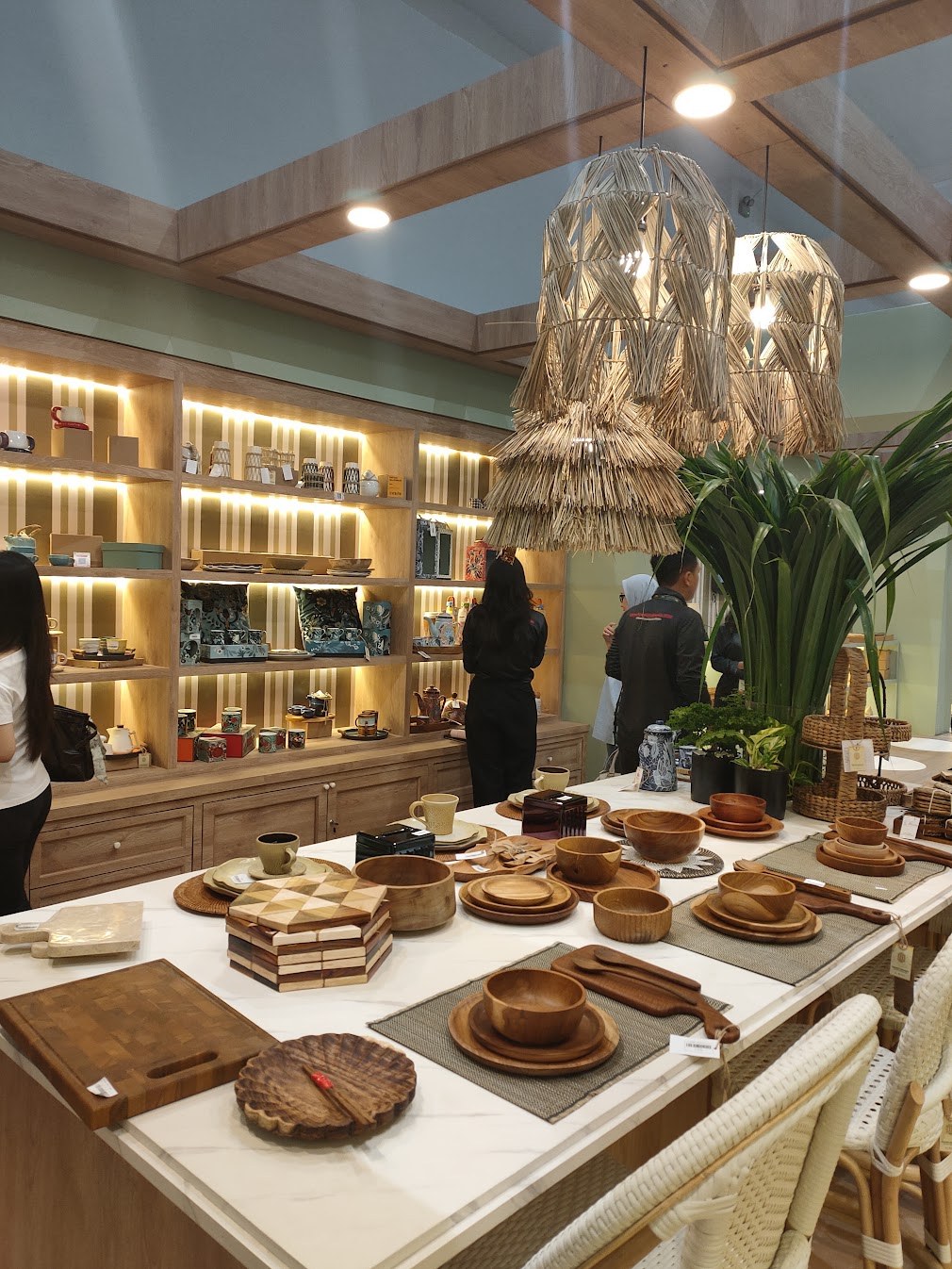 Contemporary Indonesian wooden tableware, home accessories and natural-material lighting displayed at KKI